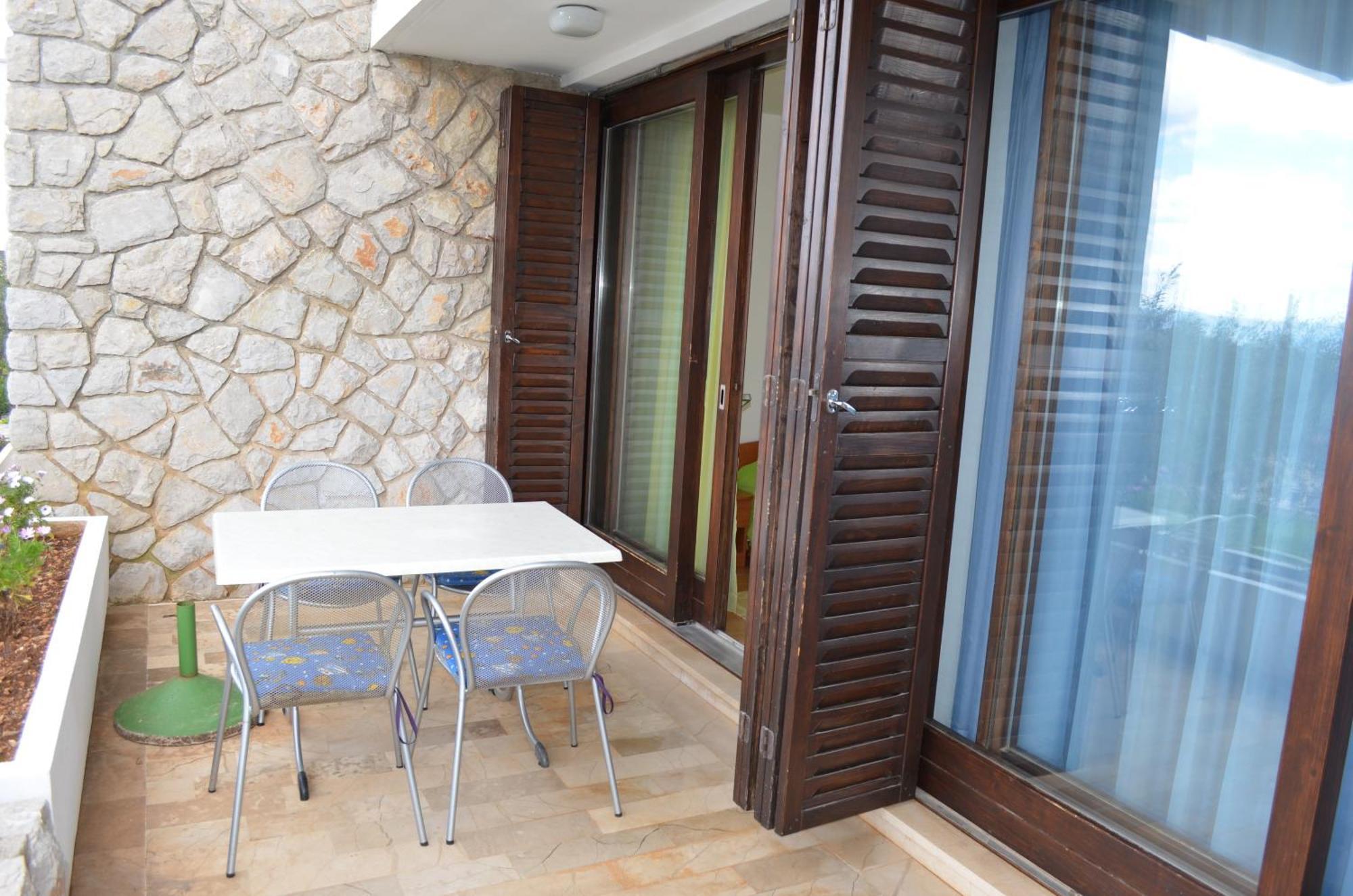 Apartments Palma & Pino Cres Pokoj fotografie